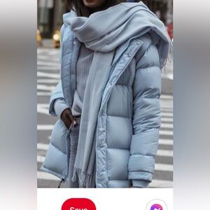 Super Puff Mid- size is XS. Light blue